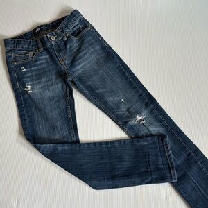 Levi’s boyfriend, distressed blue jeans.  Girls size 10